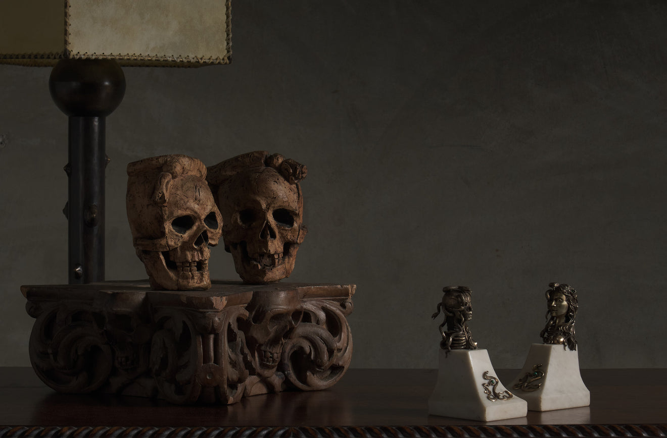 2 CARVED WOOD SKULL FORM ARCHITECTURAL ORNAMENTS