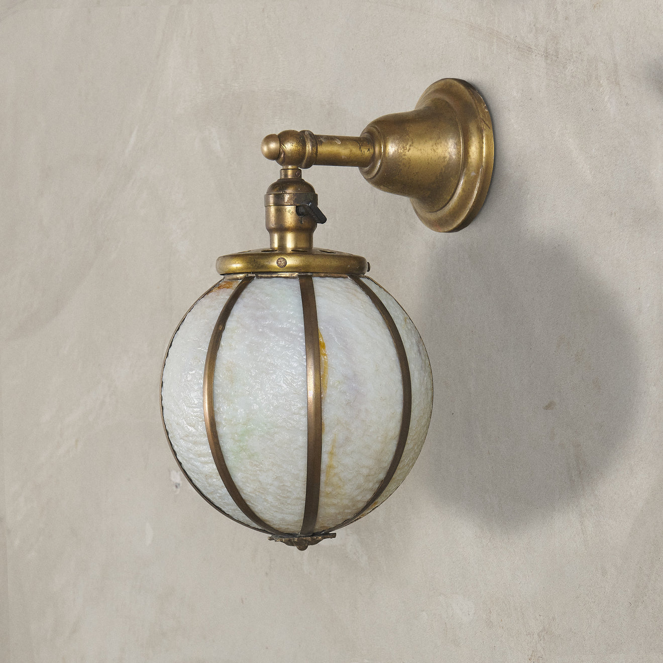BRASS AND STAINED GLASS BALL SCONCE, EARLY 20TH C, USA