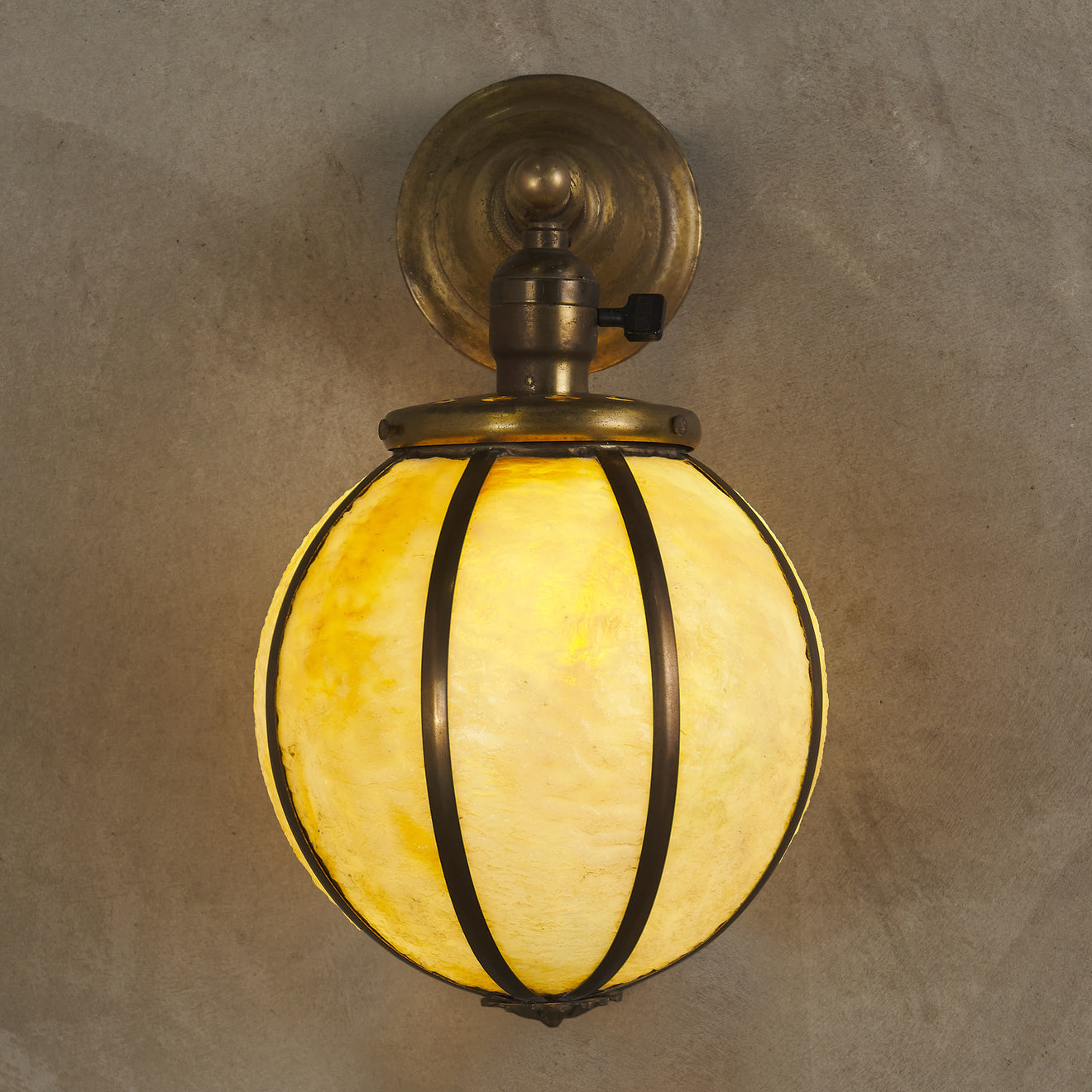 BRASS AND STAINED GLASS BALL SCONCE, EARLY 20TH C, USA