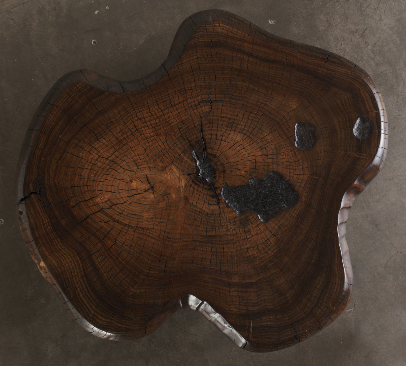 DARK COTTON WOOD COFFEE TABLE ON BASE BY DAN POLLOCK