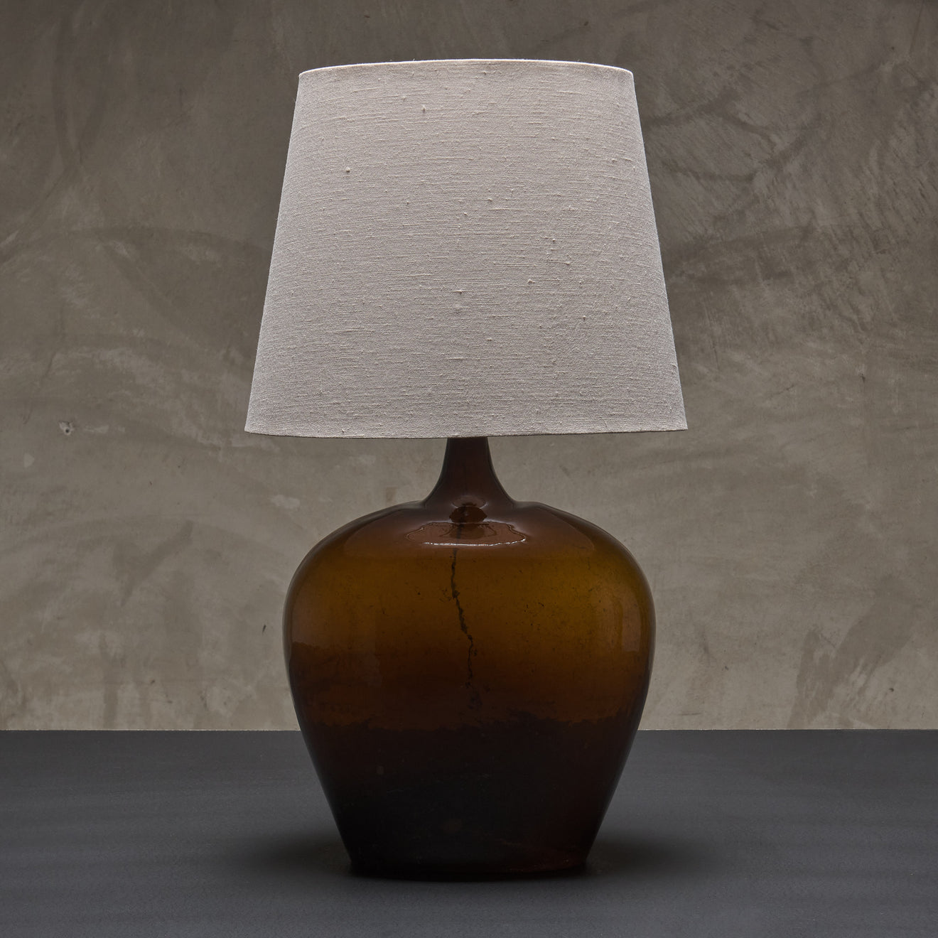 HANDBLOWN AMBER GLASS 'DAMA JUANA' MEZCAL BOTTLE TABLE LAMP