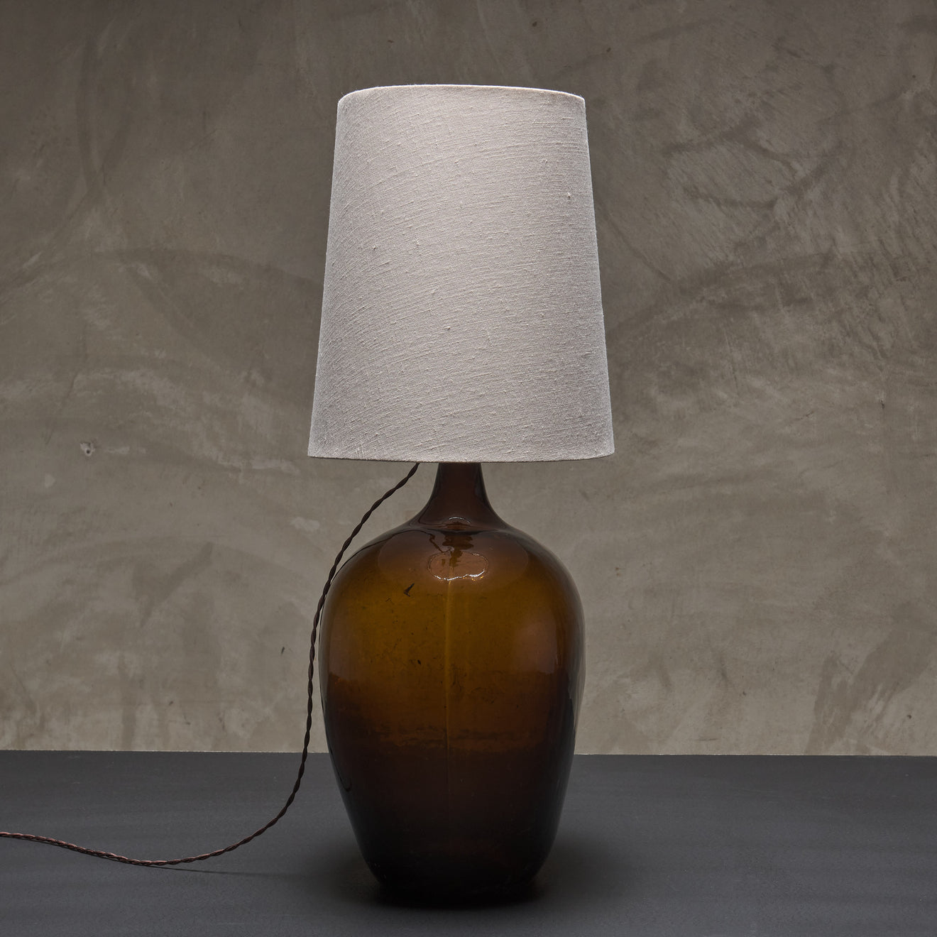 HANDBLOWN AMBER GLASS 'DAMA JUANA' MEZCAL BOTTLE TABLE LAMP