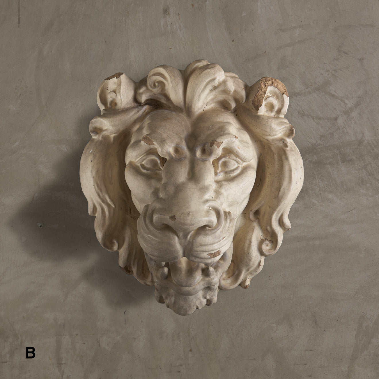 MASSIVE EARTHENWARE LION HEAD FROM THE LEONARD STANLEY ESTATE