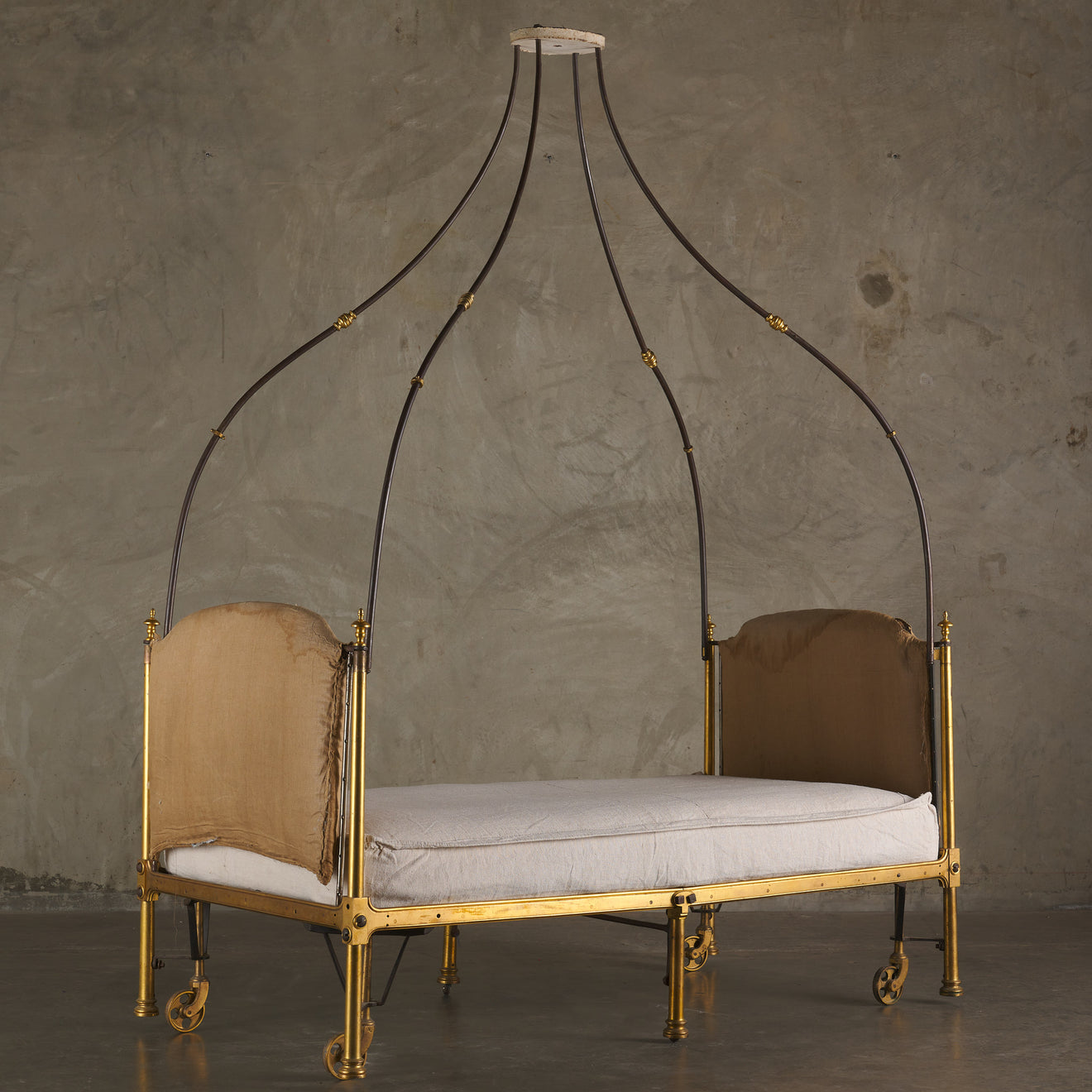 EMPIRE GILT BRONZE AND STEEL CAMPAIGN BED WITH CANOPY, ATTRIBUTED TO MARIE-JEAN DESOUCHES (1764-1828)