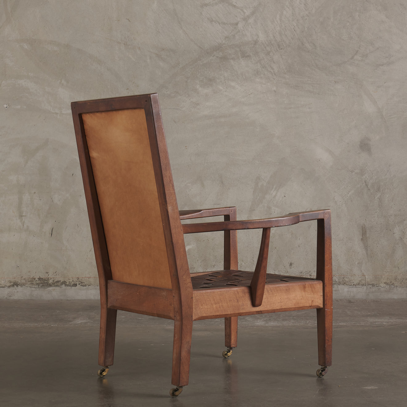 GORDON RUSSELL WOVEN LEATHER LOUNGE CHAIR, ENGLAND, EARLY 20TH CENTURY