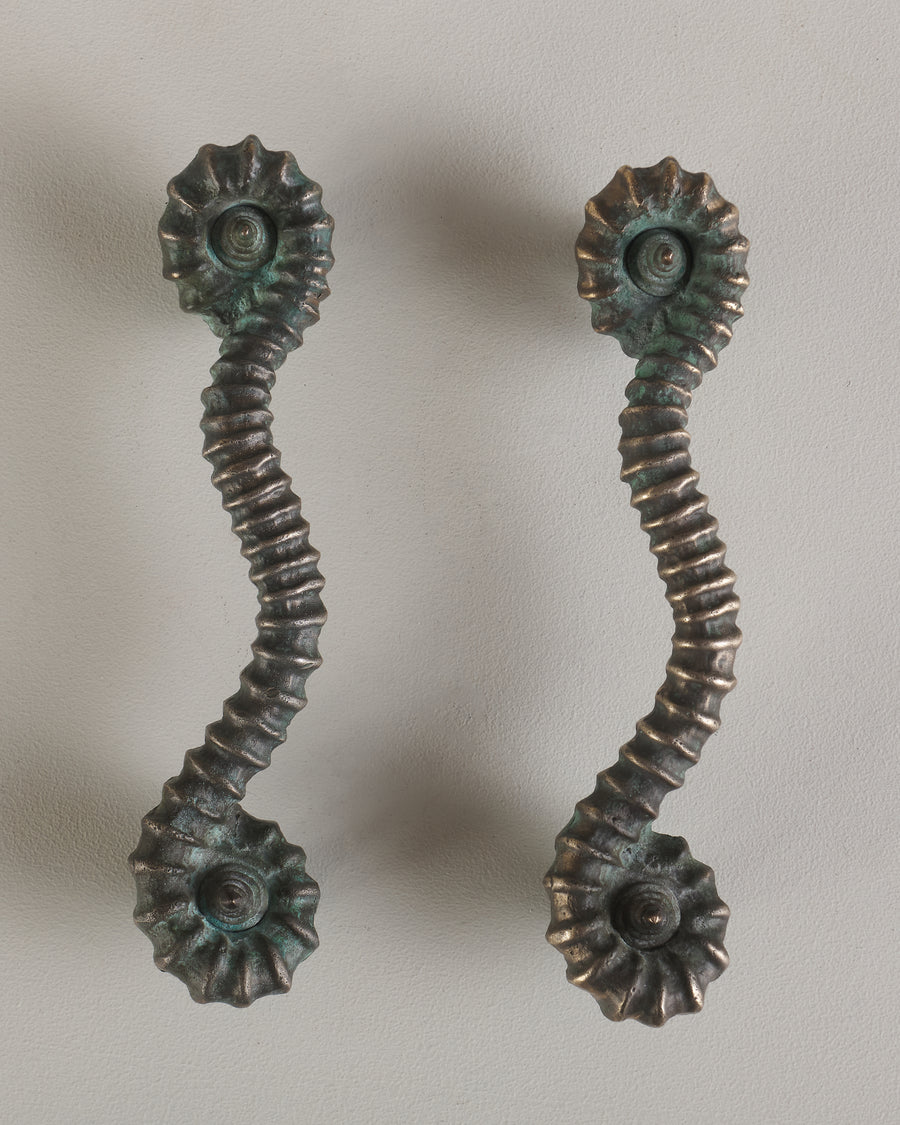 PAIR OF BRONZE AMMONITE HANDLES