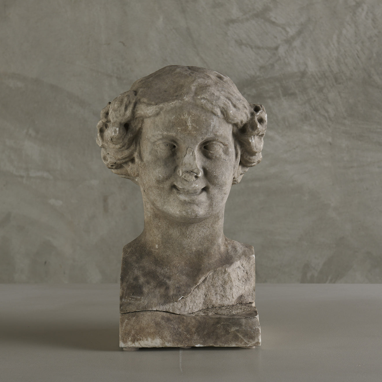 ROMAN MARBLE BUST OF BACCHUS, CIRCA 2ND CENTURY AD