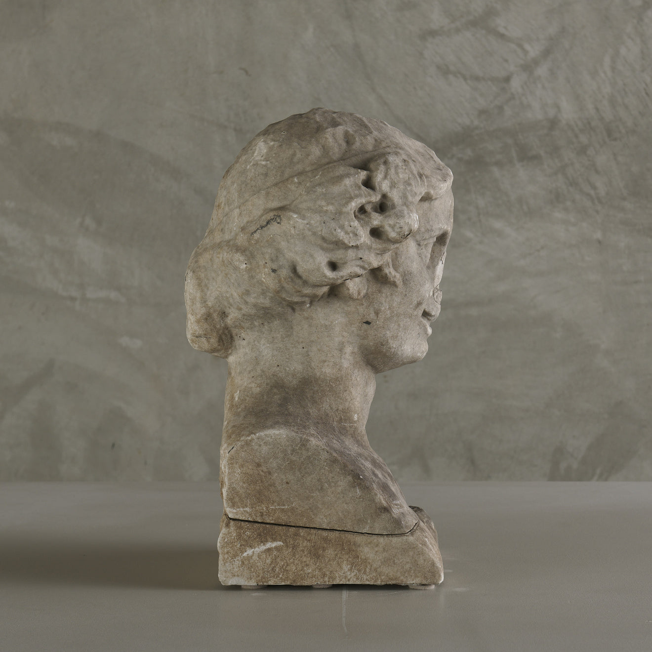 ROMAN MARBLE BUST OF BACCHUS, CIRCA 2ND CENTURY AD