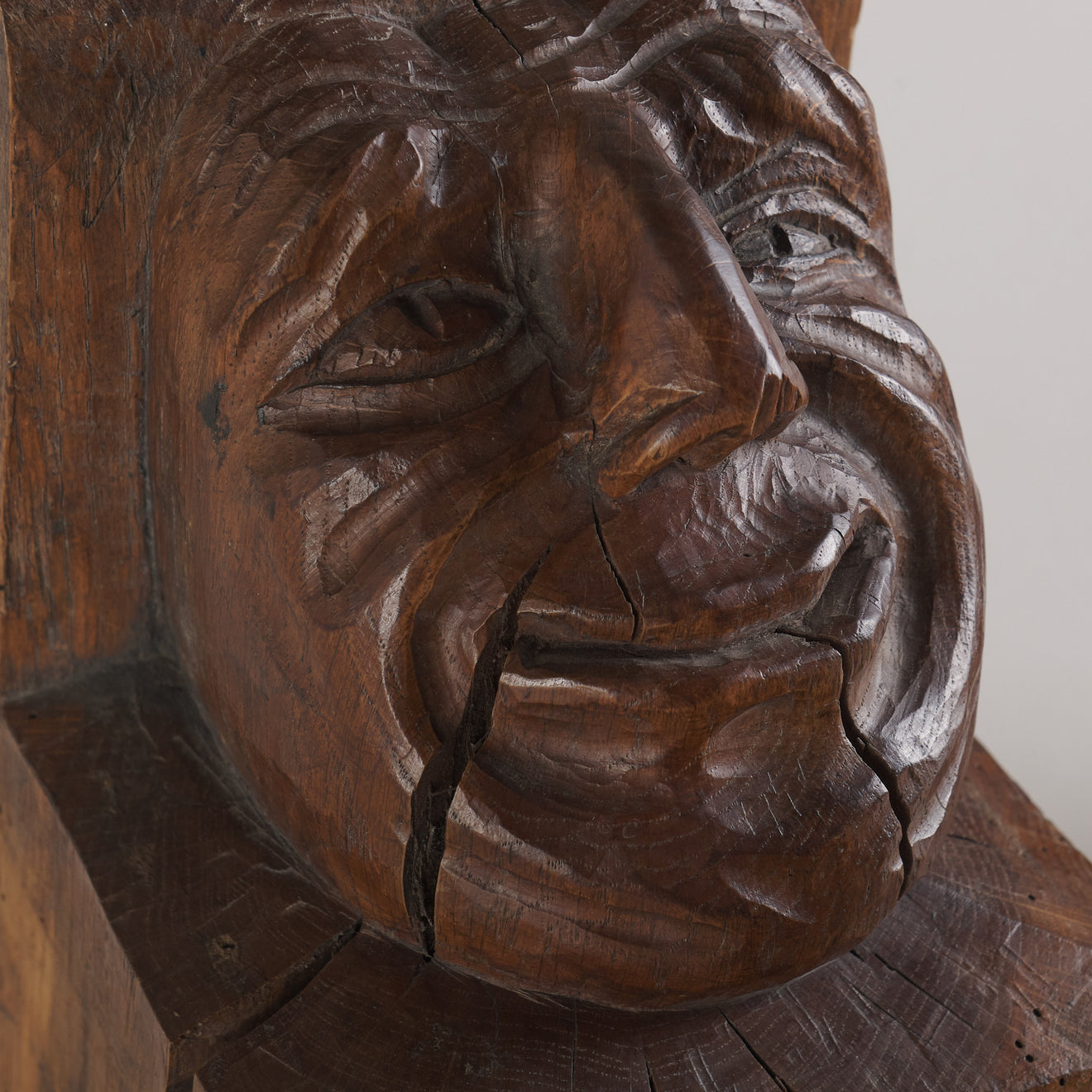 SET OF FOUR WOOD CARVED CORBELS WITH GROTESQUE FACES