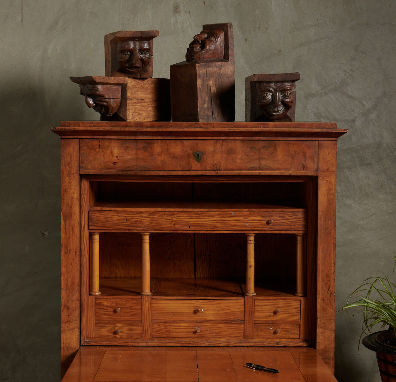 SET OF FOUR WOOD CARVED CORBELS WITH GROTESQUE FACES