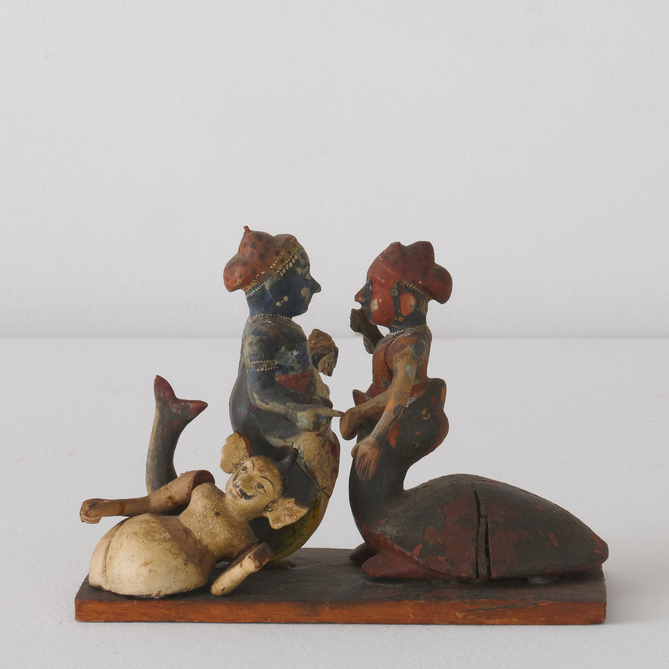 GROUP OF CARVED WOOD DEITY FIGURES