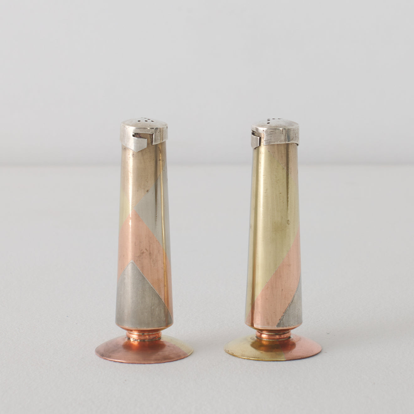 PAIR OF LOS CASTILLOS SALT & PEPPER SHAKERS IN METALES CASADOS TECHNIQUE