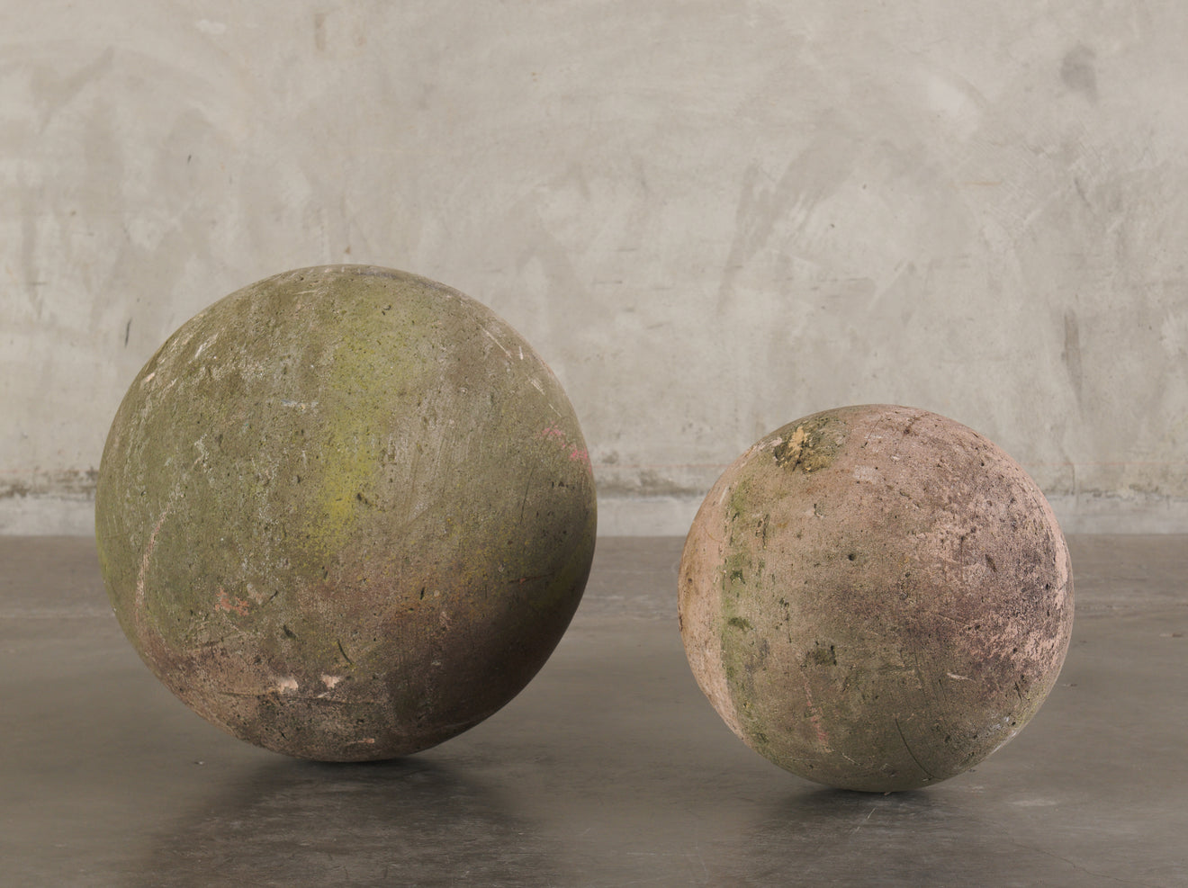 2 STONE BOUNDARY MARKERS/GARDEN BALLS
