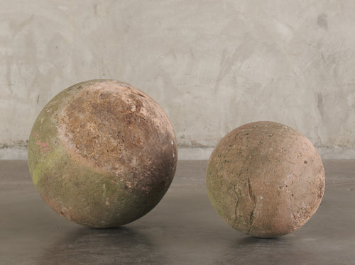 2 STONE BOUNDARY MARKERS/GARDEN BALLS