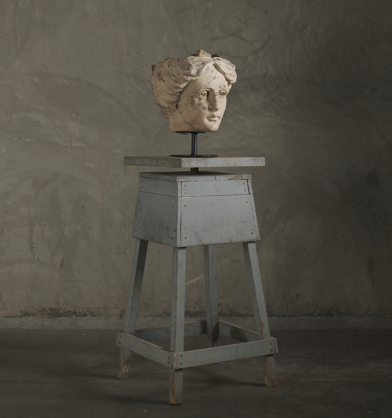 ANTIQUE ARCHITECTURAL TERRA COTTA HEAD OF A WOMAN ON STEEL MOUNT