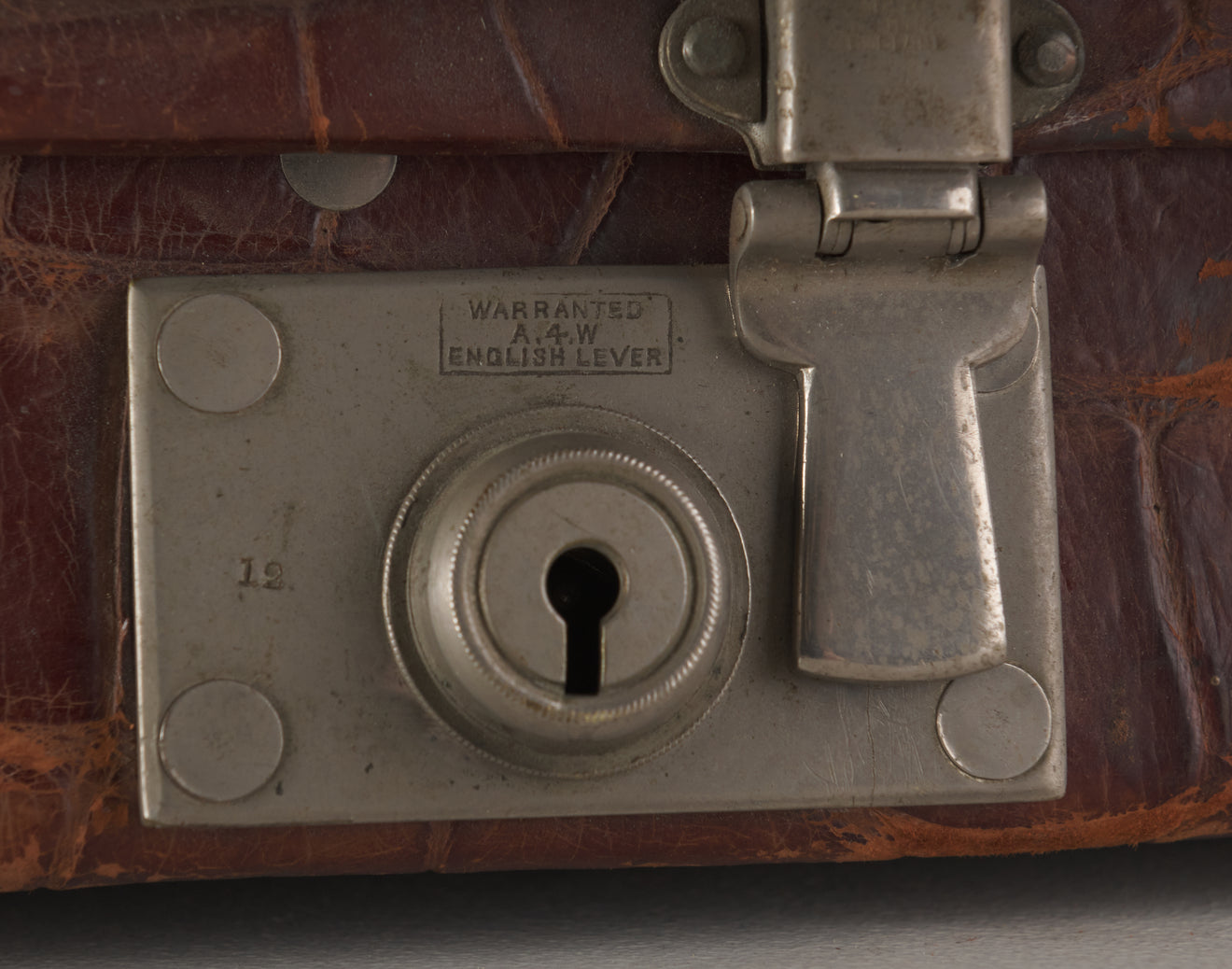 ANTIQUE EXPANDABLE CROCODILE SUITCASE, EARLY 20th C