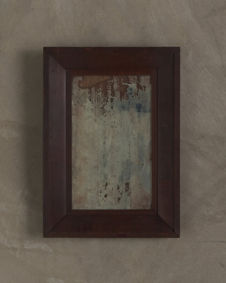 ANTIQUE WALL MIRROR IN THE EMPIRE STYLE