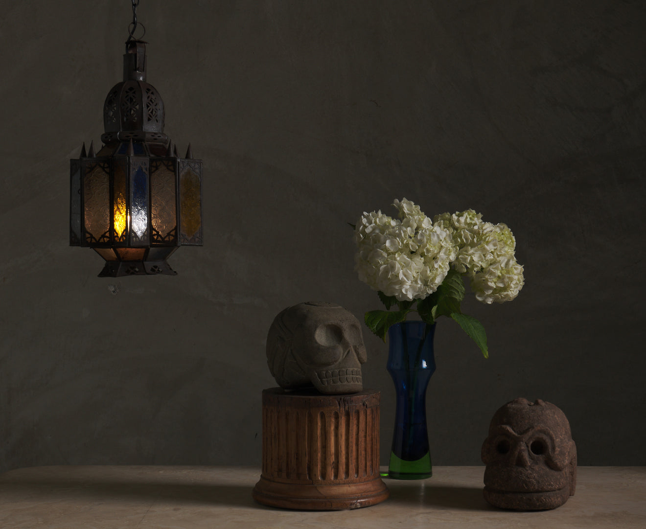 BASALT SKULL WITH CARVED SKELETON