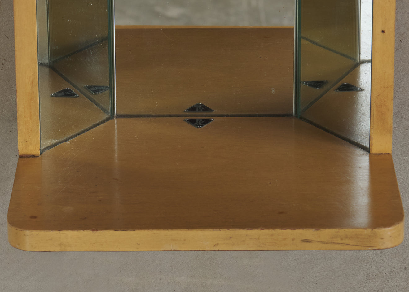 BAUSCH & LOMB WALL HANGING MIRROR, MID 20TH C