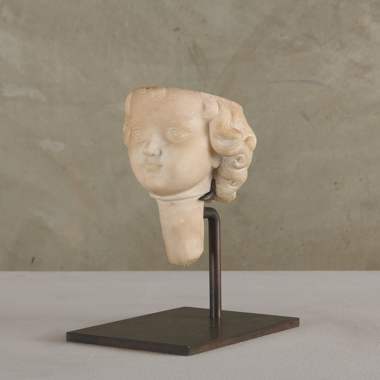 CARVED MARBLE CHERUB BUST