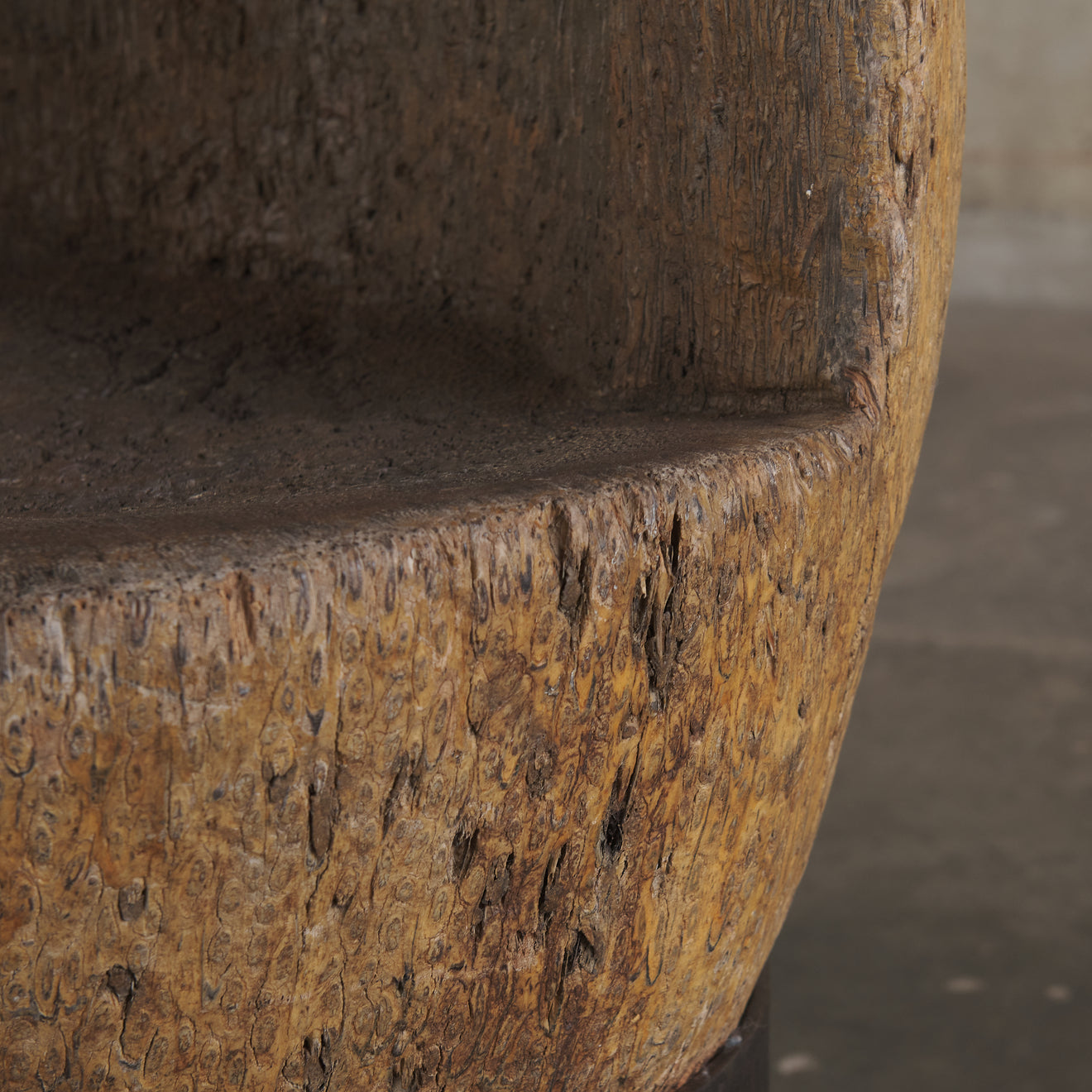 CARVED PALM WOOD CHAIR WITH IRON BASE