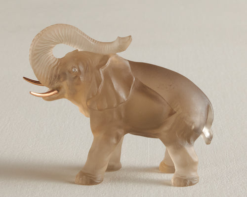 CARVED SMOKY QUARTZ ELEPHANT WITH GOLD TUSKS AND DIAMOND EYES