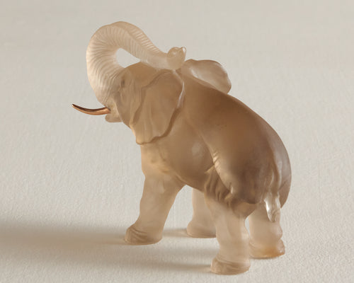 CARVED SMOKY QUARTZ ELEPHANT WITH GOLD TUSKS AND DIAMOND EYES