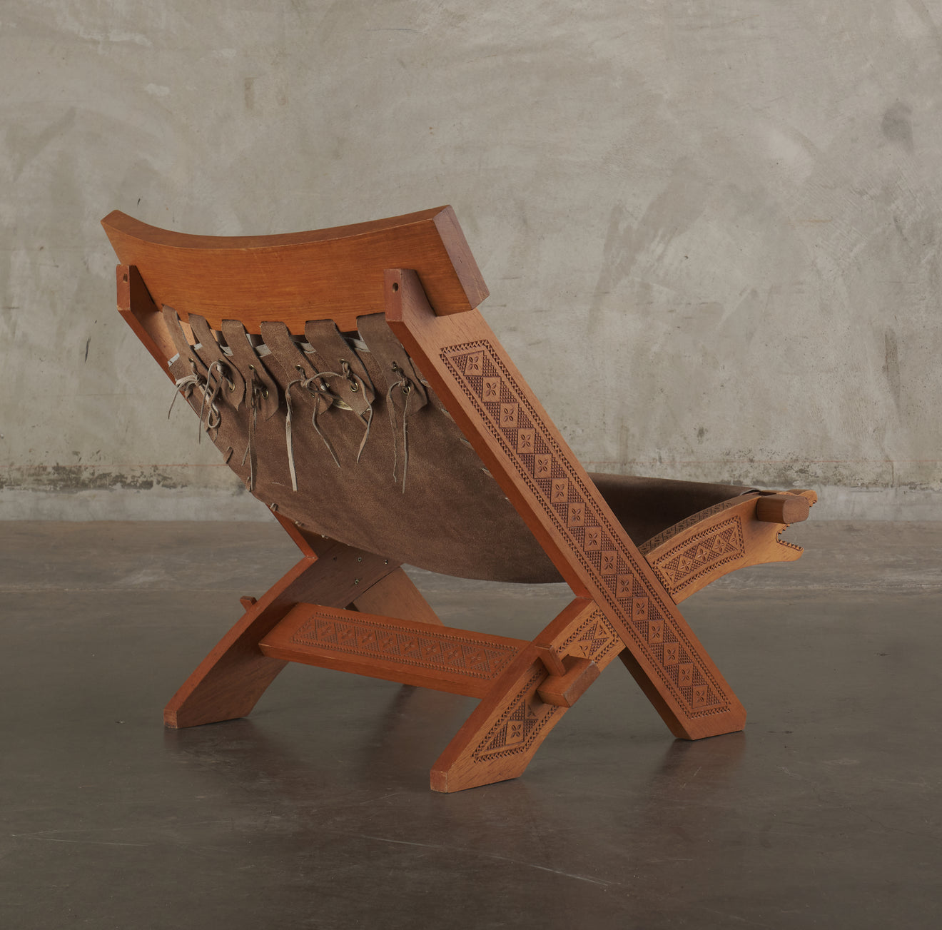 CARVED WOOD ZOOMORPHIC CAMPAIGN CHAIRS