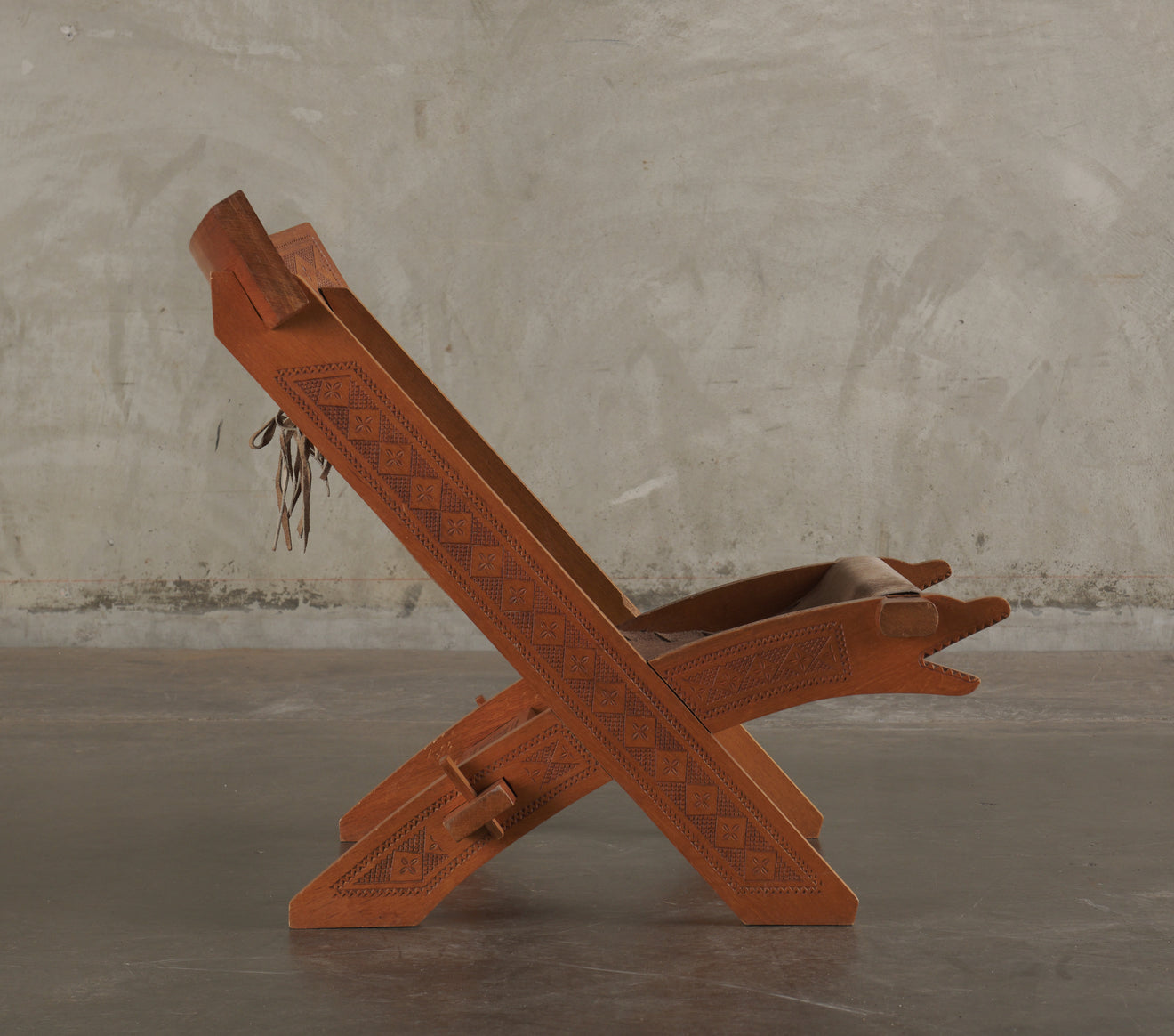 CARVED WOOD ZOOMORPHIC CAMPAIGN CHAIRS