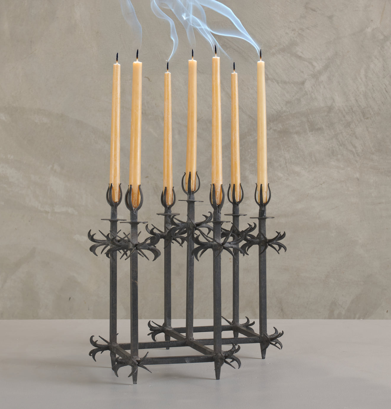 EARLY 20TH C WROUGHT IRON CANDLE HOLDER