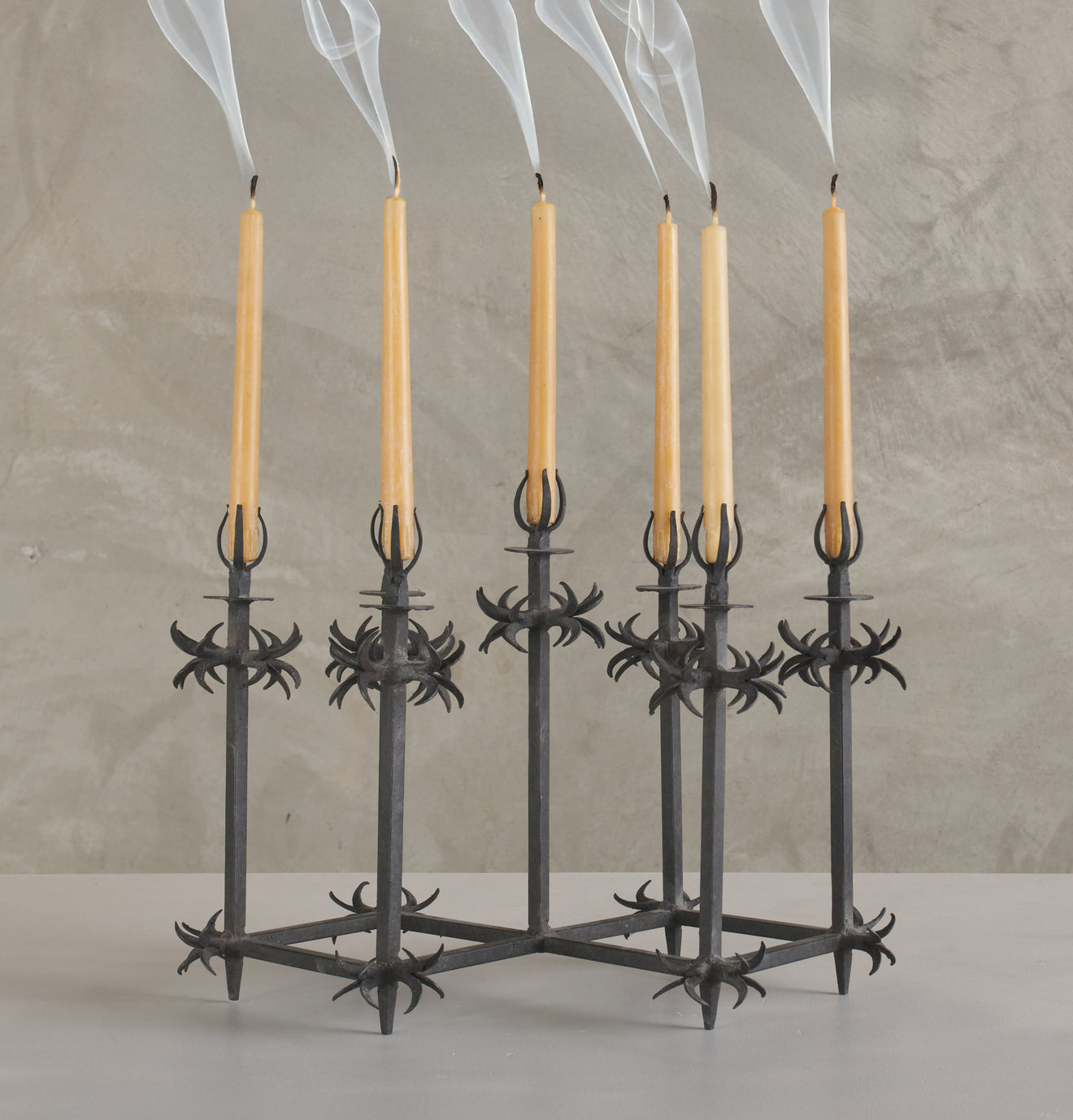 EARLY 20TH C WROUGHT IRON CANDLE HOLDER