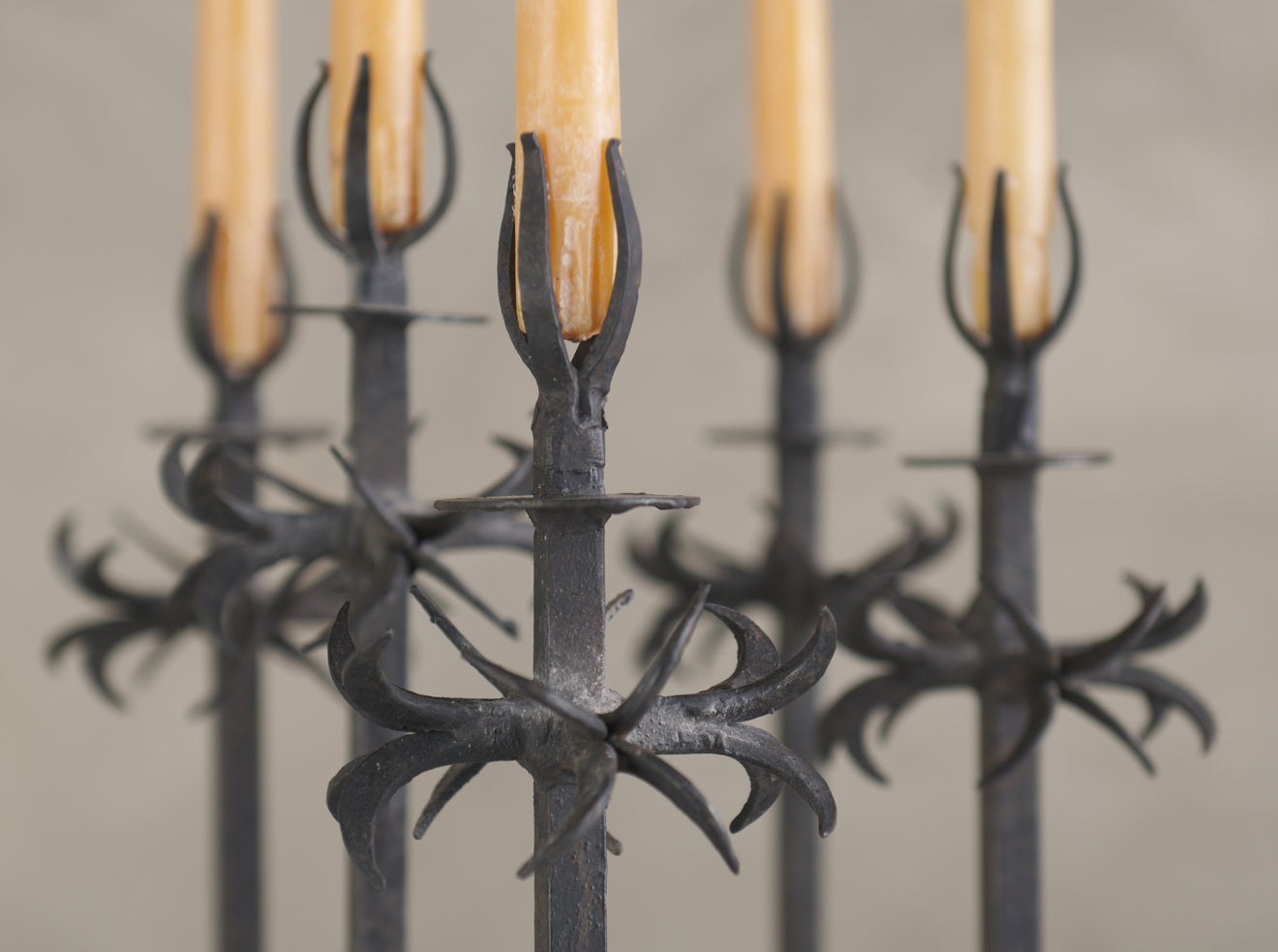EARLY 20TH C WROUGHT IRON CANDLE HOLDER