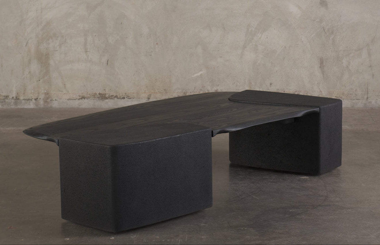 ERNESTO AZCARATE BASALT AND WOOD COFFEE TABLE
