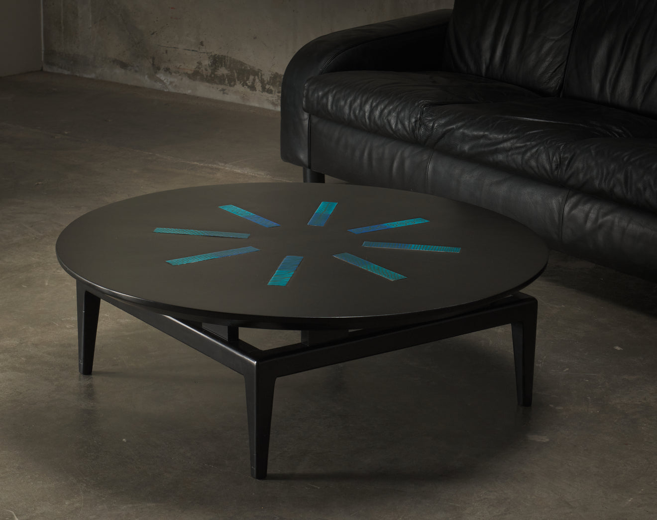 FRANK KYLE BLACK COFFEE TABLE WITH MAGGIE HOWE ENAMELED BRASS PLATES