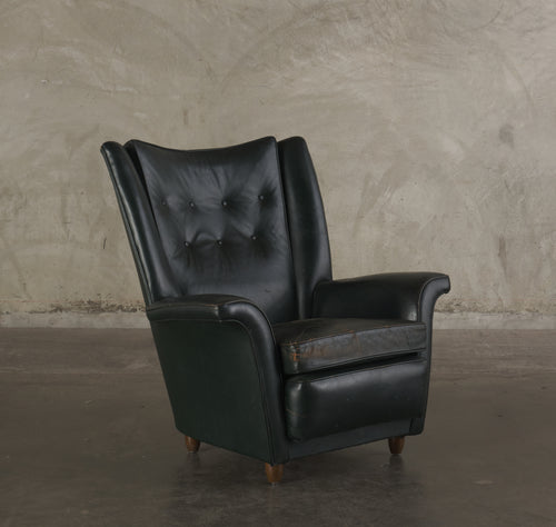 GREEN ROCKING WING BACK LOUNGE CHAIR, MID 20TH C