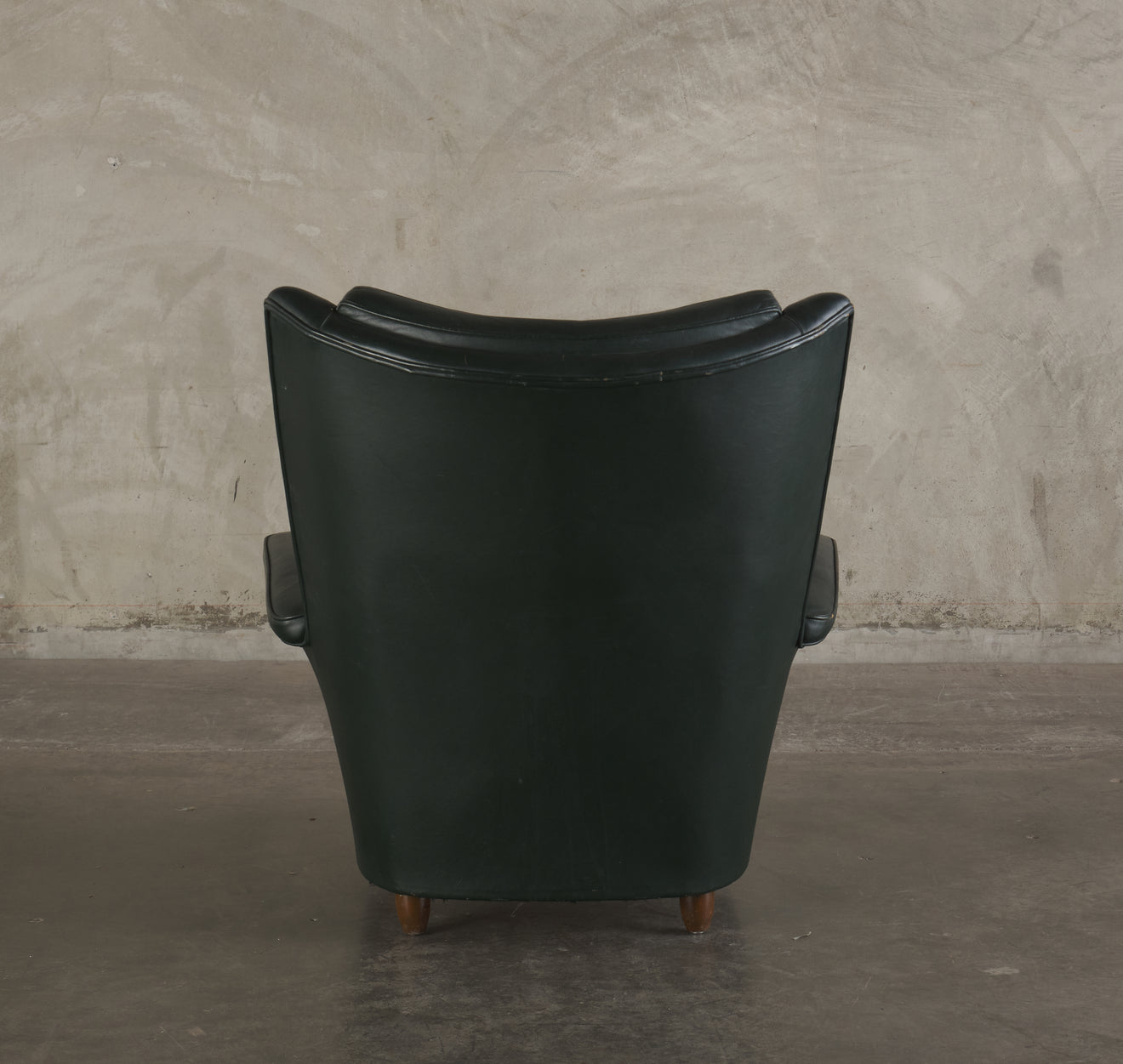GREEN ROCKING WING BACK LOUNGE CHAIR, MID 20TH C