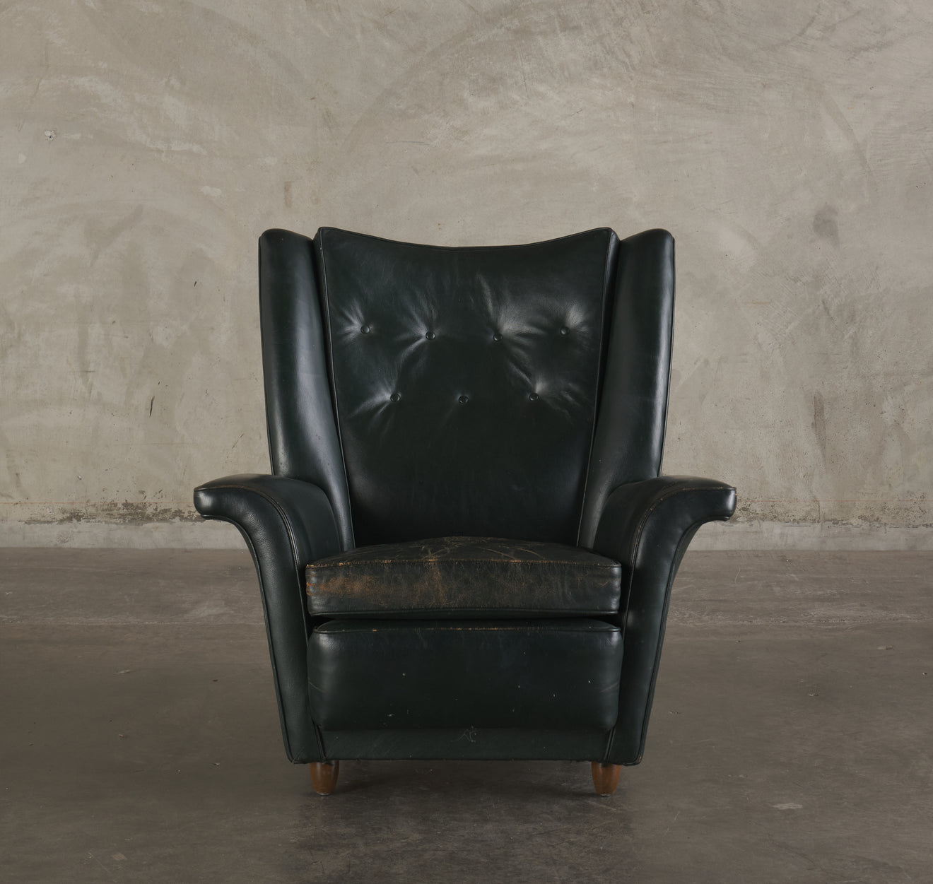 GREEN ROCKING WING BACK LOUNGE CHAIR, MID 20TH C