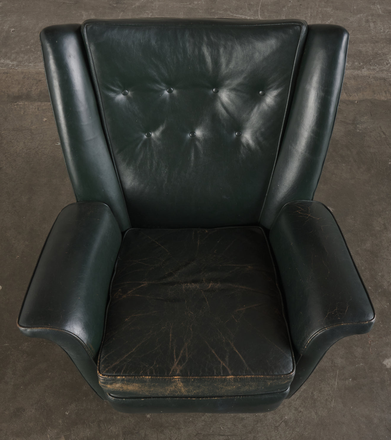 GREEN ROCKING WING BACK LOUNGE CHAIR, MID 20TH C
