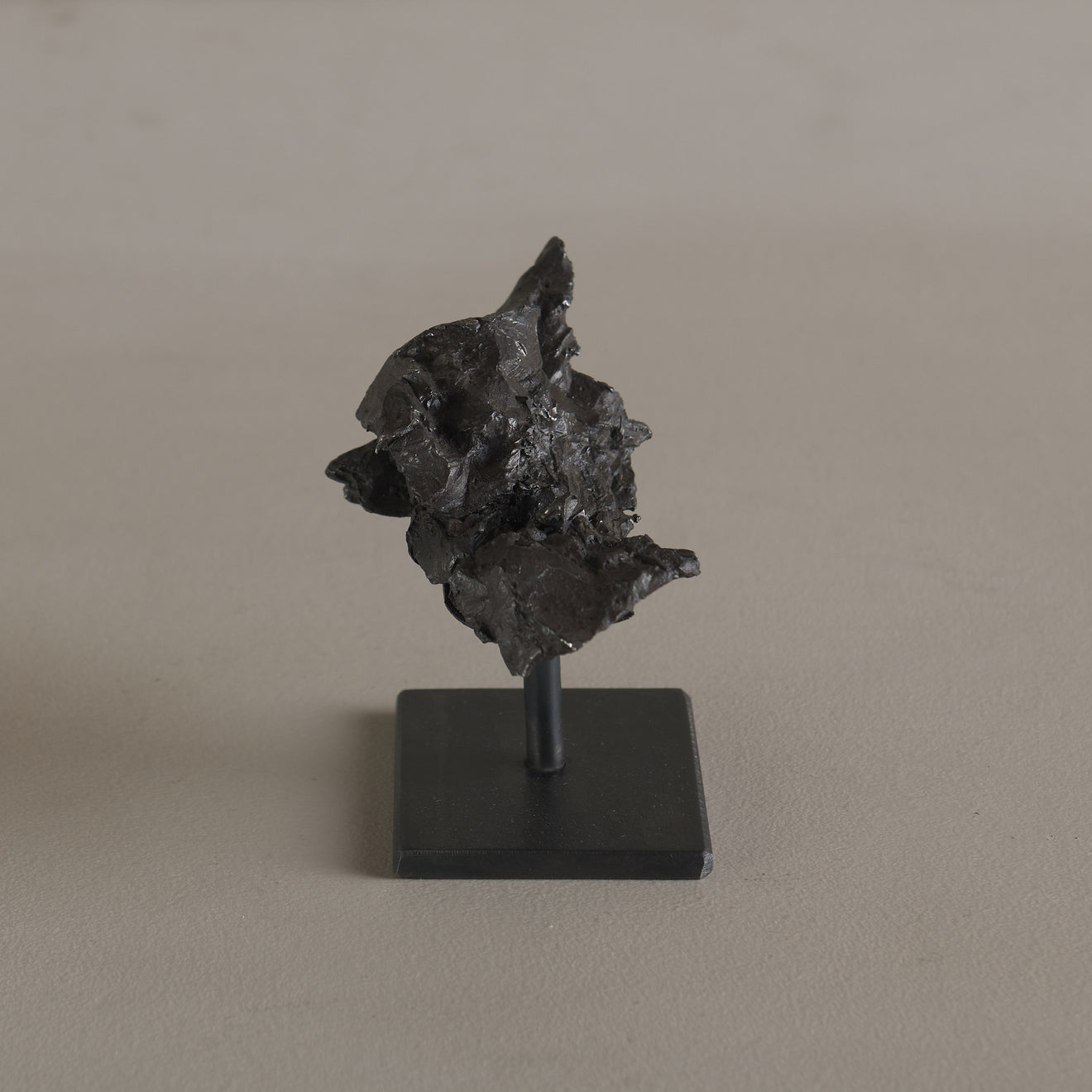 METEORITE ON STEEL STAND