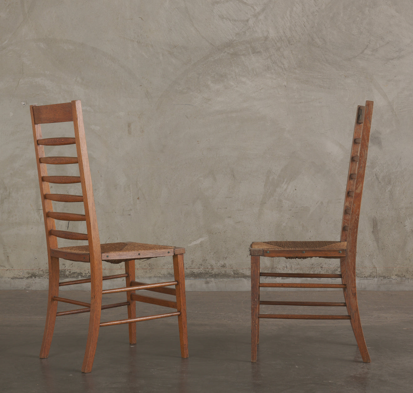 PAIR OF ARTS & CRAFTS GLASGOW SCHOOL LADDER BACK CHAIRS