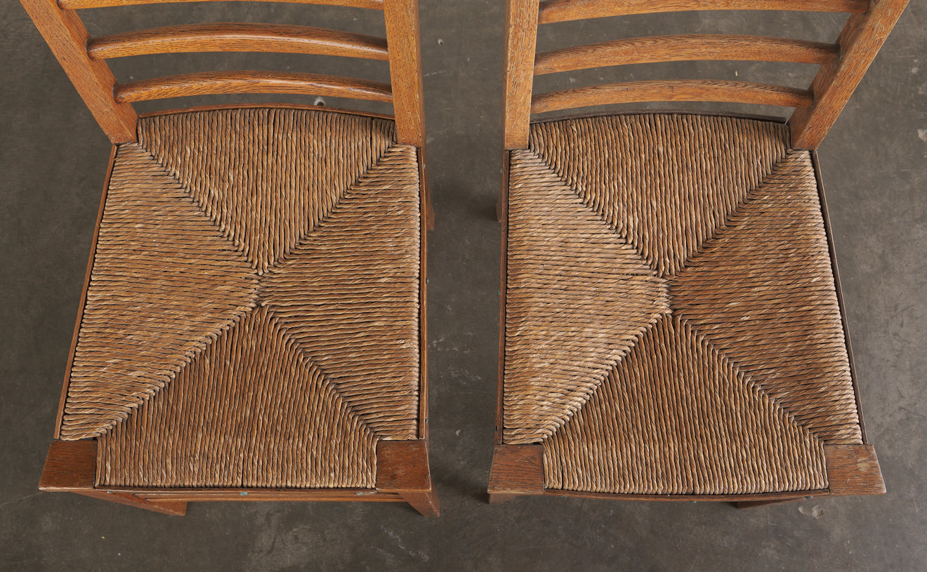 PAIR OF ARTS & CRAFTS GLASGOW SCHOOL LADDER BACK CHAIRS