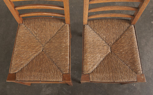 PAIR OF ARTS & CRAFTS GLASGOW SCHOOL LADDER BACK CHAIRS