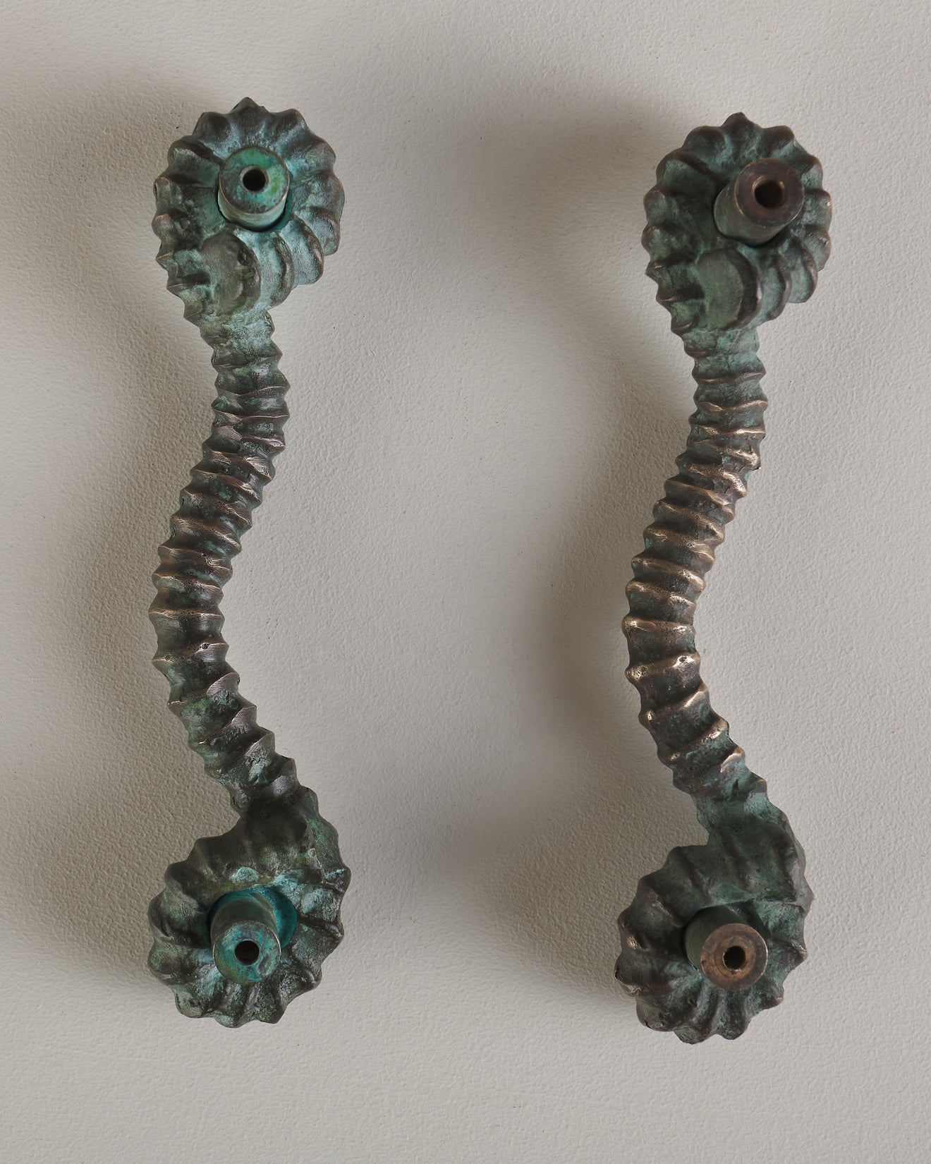 PAIR OF BRONZE AMMONITE HANDLES