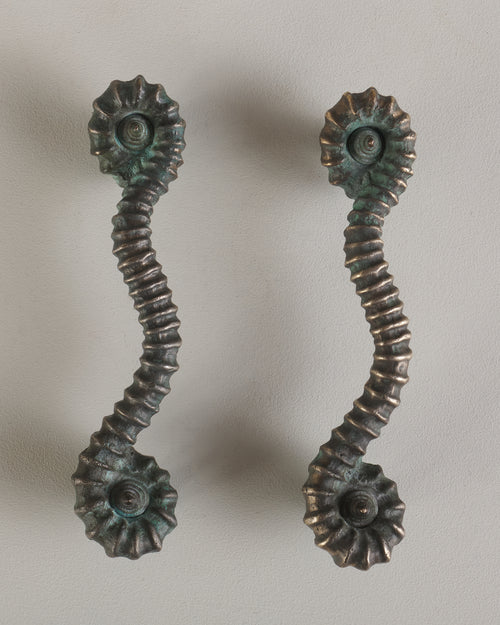 PAIR OF BRONZE AMMONITE HANDLES