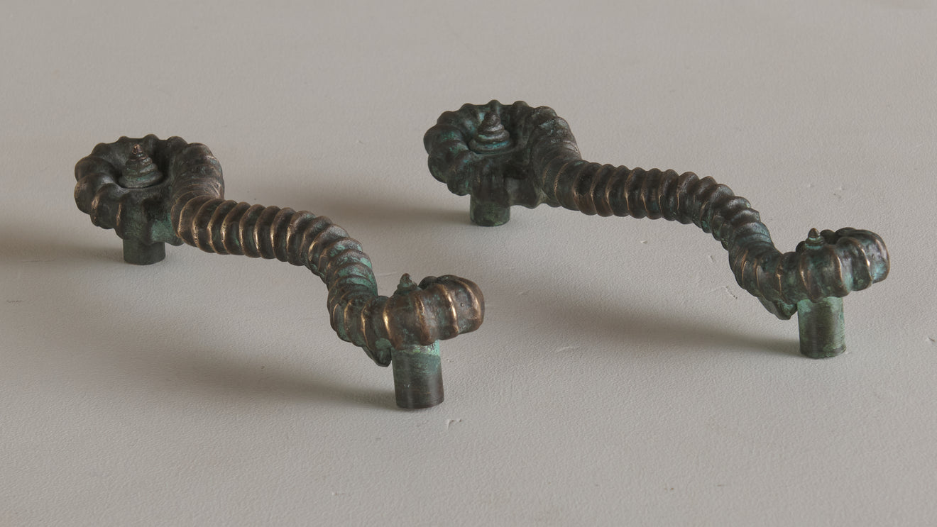 PAIR OF BRONZE AMMONITE HANDLES