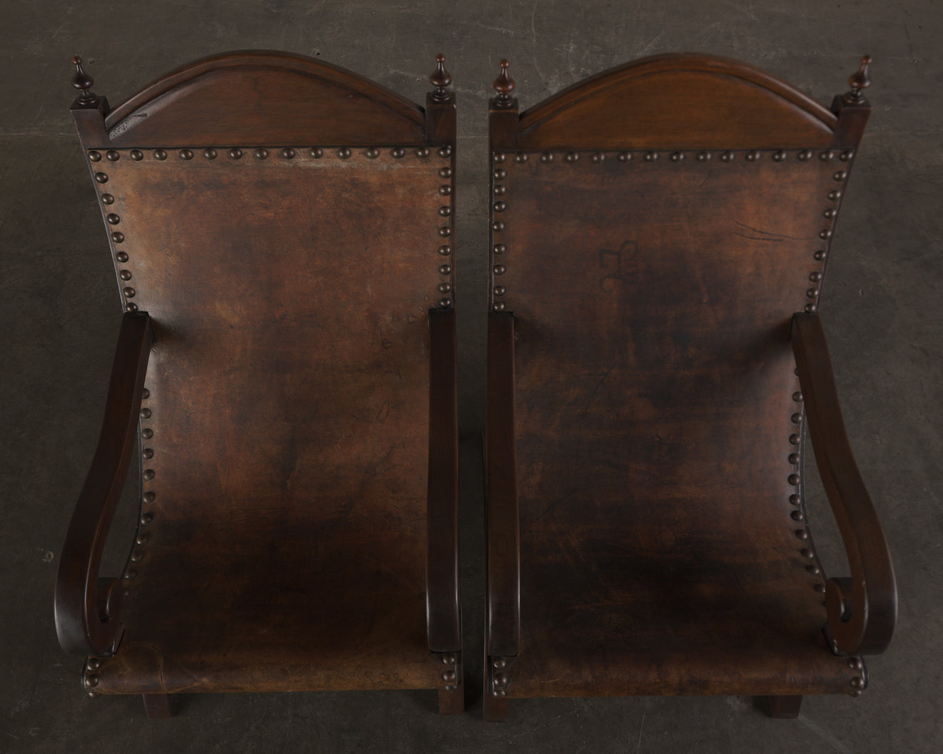 PAIR OF BUTAQUE ARM CHAIRS