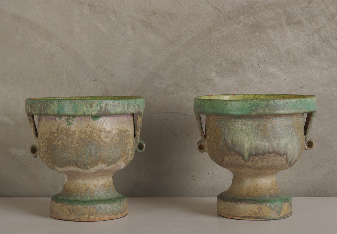 PAIR OF CHRIS BROCK EAST SIDE GREEN CERAMIC TABLE TORCHIERES, 30'S STYLE