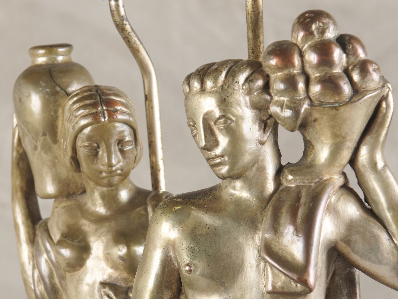 PAIR OF ART DECO SILVERED BRASS FIGURAL LAMPS, c1920