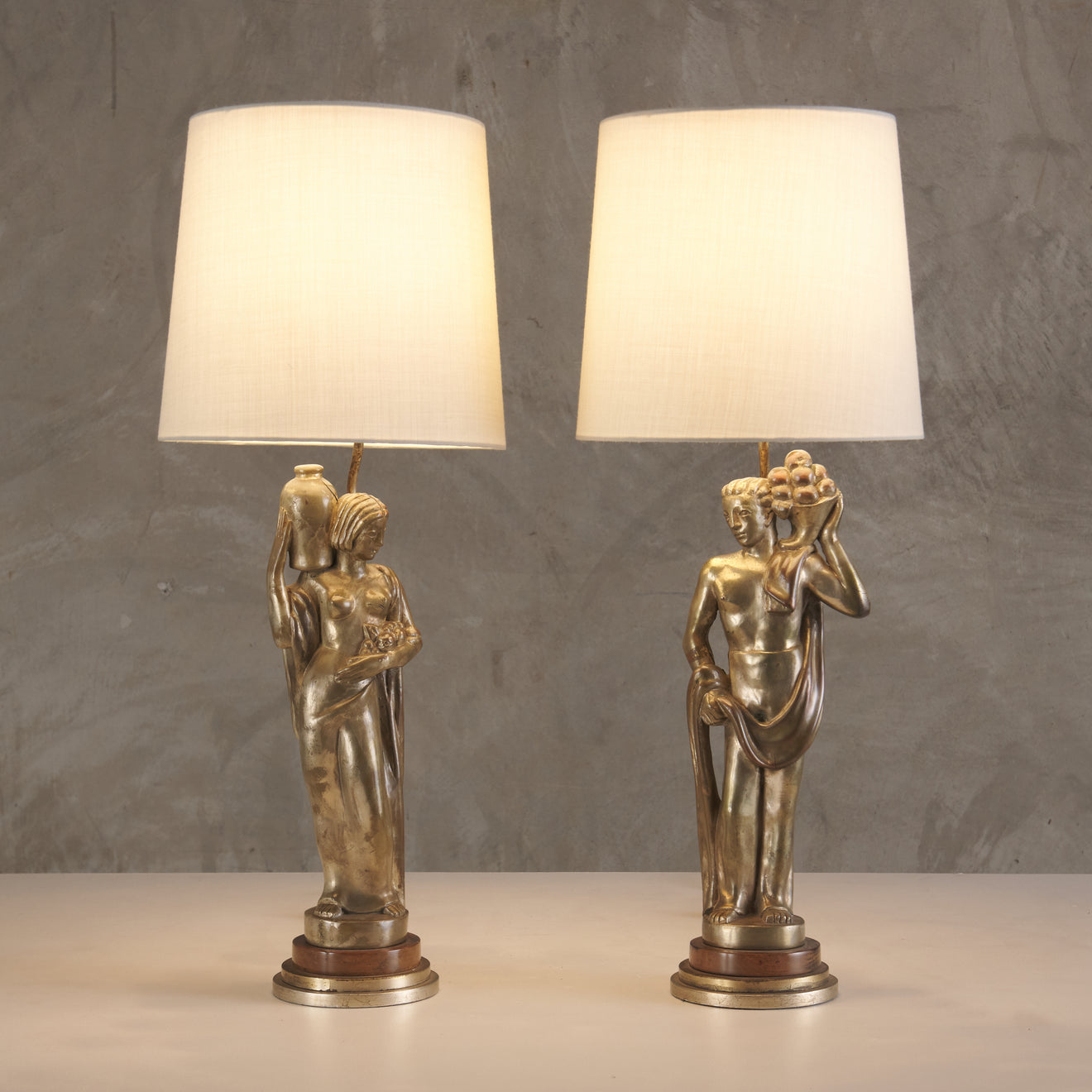 PAIR OF ART DECO SILVERED BRASS FIGURAL LAMPS, c1920