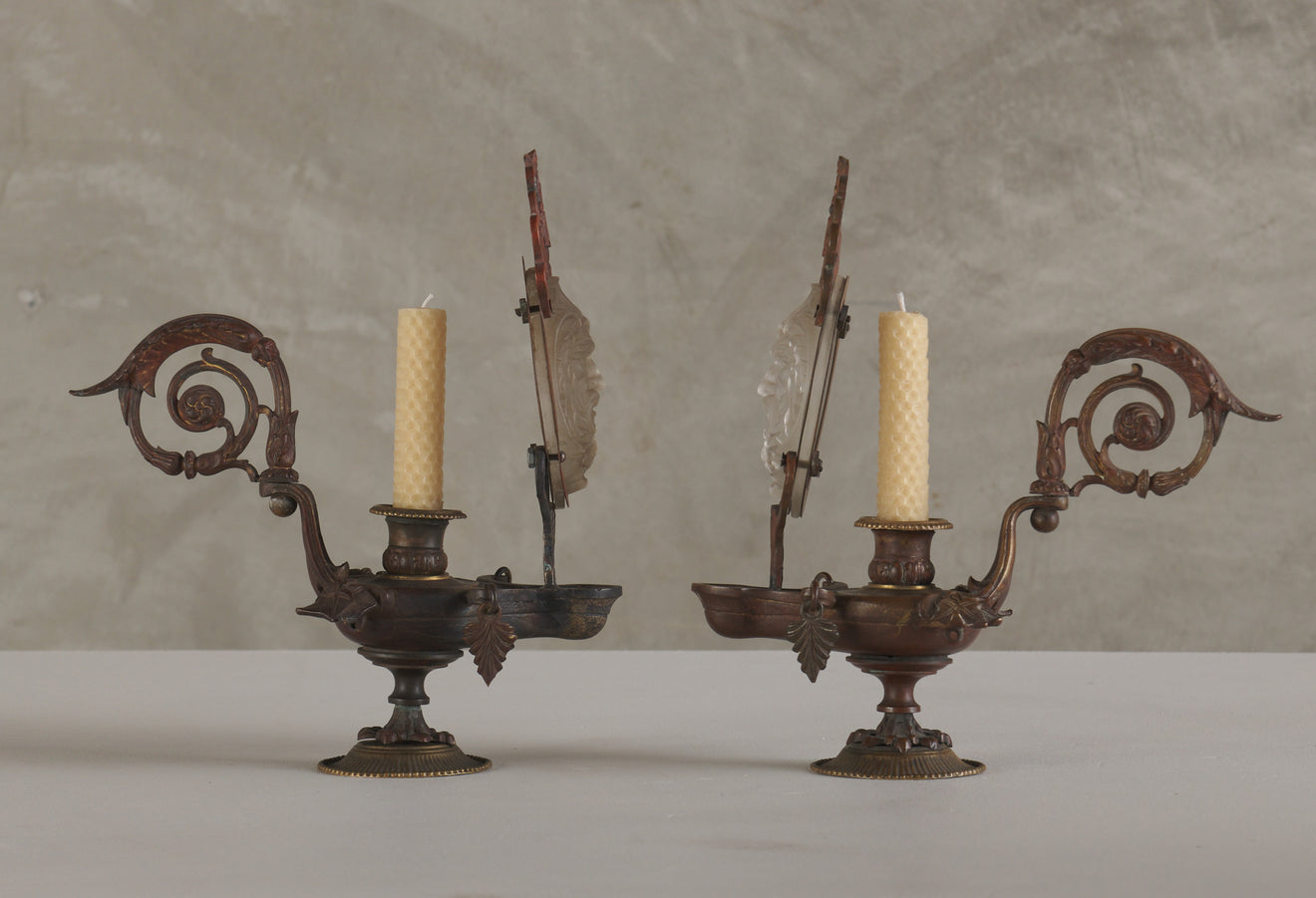 PAIR OF TABLE CANDLEHOLDERS IN THE SHAPE OF ROMAN OIL LAMPS WITH OPALINE BACCART (ATTRIB) CRYSTAL, FRENCH